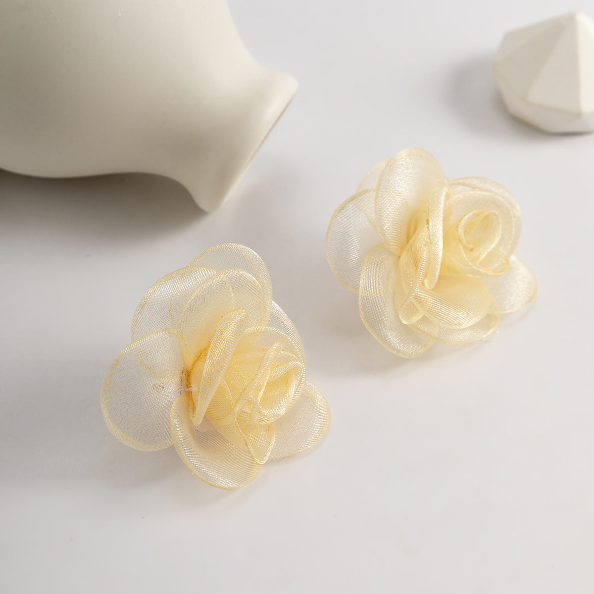 Mesh rose studs